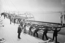 Life boat drill, Holland America Line - putting boats over the side, between c1910 and c1915. Creator: Bain News Service.