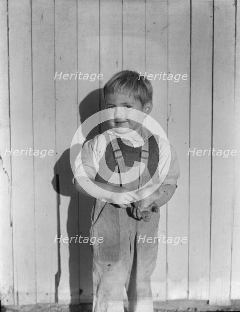 Youngest child of four of rural rehabilitation client, Near San Fernando, California, 1935. Creator: Dorothea Lange.
