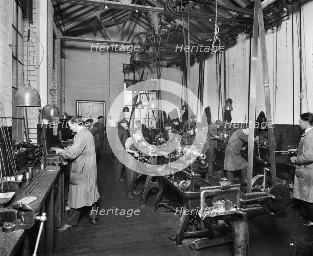The Birmingham Small Arms factory, Small Heath, Birmingham, February 1917. Artist: Adolph Augustus Boucher.