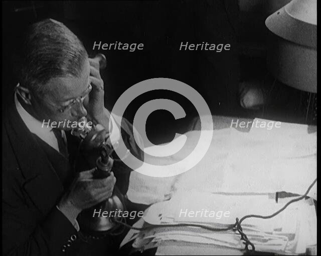 Journalist at Work on a Telephone, 1921. Creator: British Pathe Ltd.