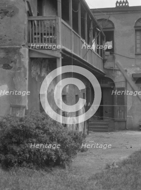 Courtyard, New Orleans, between 1920 and 1926. Creator: Arnold Genthe.