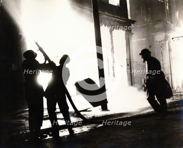 Burning shop, Shoreditch High Street, London, the Blitz, World War II, c1940-c1944. Artist: Unknown