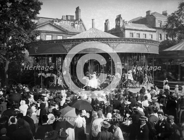 Carousel ride, St Giles Fair, Oxford, Oxfordshire, 1895. Creator: Henry Taunt.