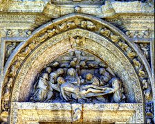 Tympanum of the Pieta on the façade of the Dominican nuns convent of Casalareina,16th century, in…