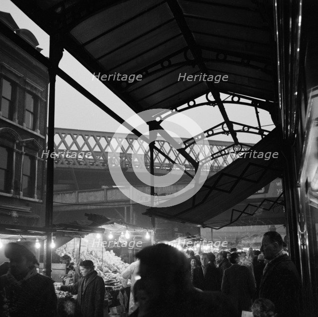 Street market in Electric Avenue, Brixton, London, 1962-1964. Artist: John Gay