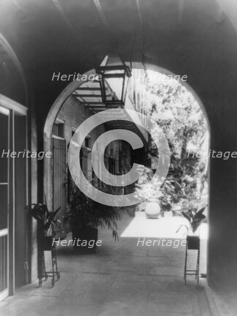 Patio on Bourbon Street, New Orleans, 1937 or 1938. Creator: Frances Benjamin Johnston.