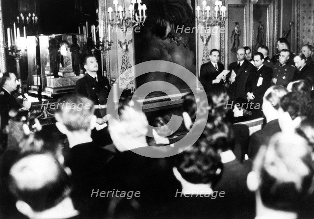 Otto Abetz, German ambassador to France, holding a press conference, Paris, 15 December 1940. Artist: Unknown