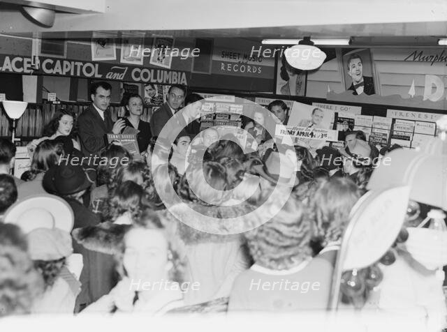 Portrait of Tommy Dorsey, record store, Washington, D.C., 1938. Creator: William Paul Gottlieb.