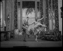 Scene from a Stage Show: Male and Female Civilians Dancing on a Stage in a Routine with..., 1929. Creator: British Pathe Ltd.
