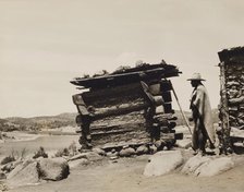 Untitled (Man with Wooden Structure, New Mexico), c.between 1920 and 1940. Creator: Guillermo Bravo.