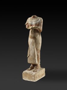 Figure of Pharaoh Akhenaten holding an offering table, XVIIIth Dynasty, c1540-c1292BC. Artist: Unknown.