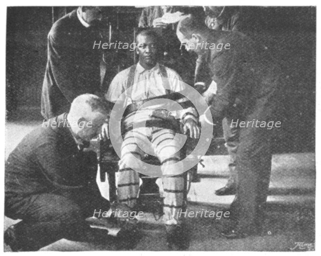 'Strapping the Victim into the Death Chair', United States, 1898. Artist: Unknown