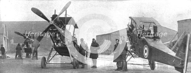 ''Combat Aerien; Parmi les forces alliees aerienes; Montage d'areoplanes repares dans un..., 1917-18 Creator: Unknown.