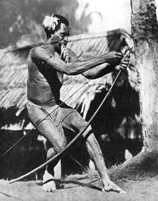 A huntsman stringing his bow, 1936.Artist: Wide World Photos