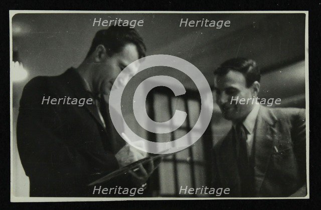 Dave Brubeck signing an autograph, c1950s. Artist: Denis Williams