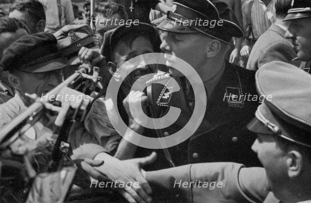 Adolf Hitler meets the people, 1936. Artist: Unknown