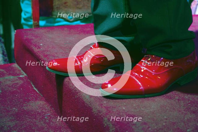 The shiny red shoes of one of the performers from Buena Vista Social Club, Havana, Cuba, 2024. Creator: Ethel Davies.