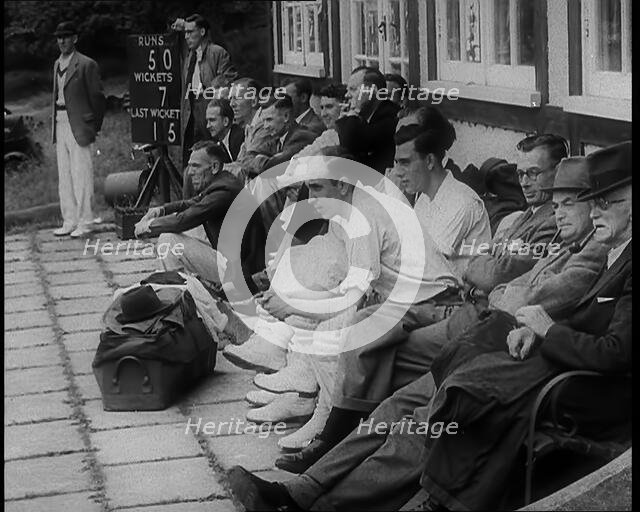 Men, Some in Cricket Gear, 1940. Creator: British Pathe Ltd.