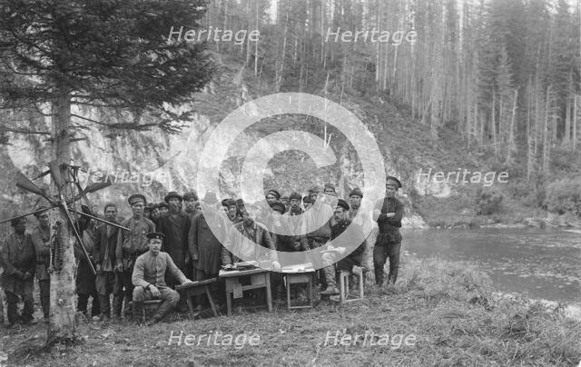 Group of Shoria Men with Members of the Land-Management Expedition, 1913. Creator: GI Ivanov.