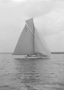 Light winds for the 8 Metre 'Ventana' (H11) sailing with spinnaker, 1912. Creator: Kirk & Sons of Cowes.