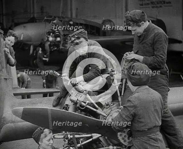 Women Working on an Aeroplane Engine, 1942. Creator: British Pathe Ltd.