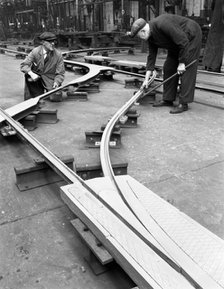 Assembling trackwork in an ICI factory, Sheffield, South Yorkshire, 1963.  Artist: Michael Walters