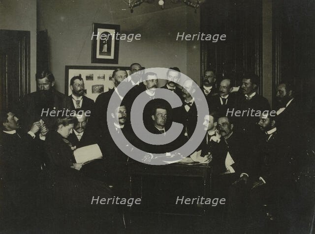 Frances Benjamin Johnston, seated in profile at left, group portrait with 18..., c1880 - 1900. Creator: Frances Benjamin Johnston.