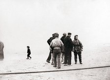 Men on the shore, Scheveningen, Netherlands, 1898.Artist: James Batkin