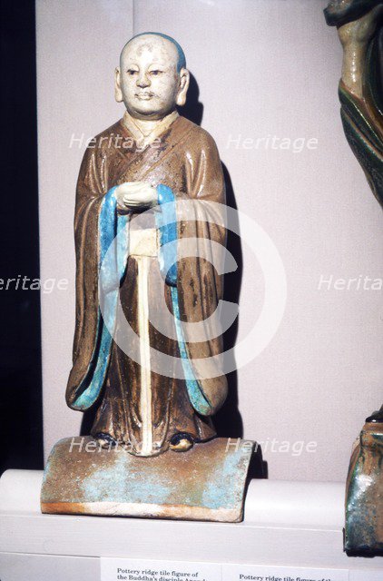 Chinese Pottery Ridge Tile figure of Buddhas disciple, Ming Dynasty. 16-17th century. Artist: Unknown.