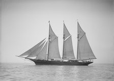 The three-mast auxiliary schooner 'Invincible', 1911. Creator: Kirk & Sons of Cowes.