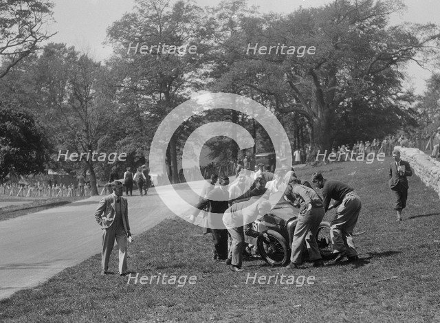 Crashed Austin 7 of B Sparrow, Donington Park Race Meeting, Leicestershire, 1933. Artist: Bill Brunell.