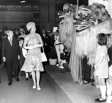 The Queen and Prince Andrew meet Singapore Forces dressed as lions at the Royal Tournament, 1972. Artist: Unknown