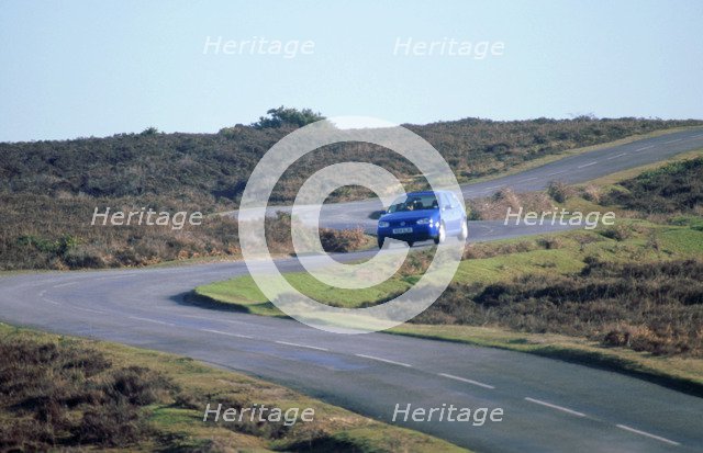 1999 Volkswagen Golf tdi. Artist: Unknown.