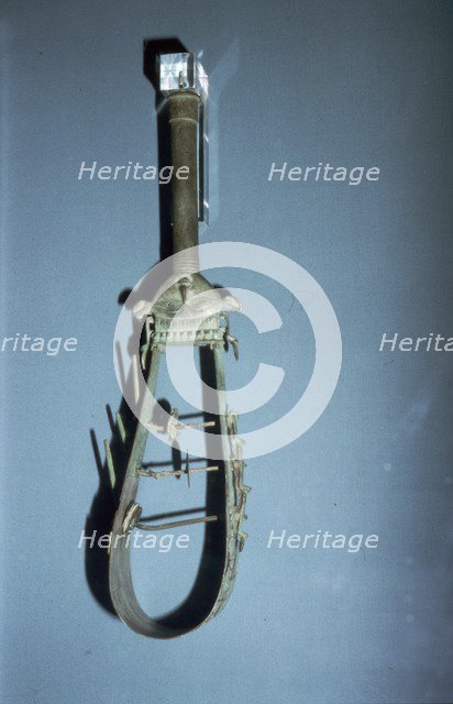 Bronze arched sistrum with Hathor head decoration, late Period, after 600BC. Artist: Unknown.