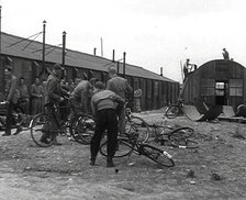 American Airmen Queueing up Outside a Building at an Airfield in England, 1943-1944. Creator: British Pathe Ltd.