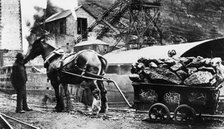 A pithead scene, postcard, 1910. Creator: Unknown.
