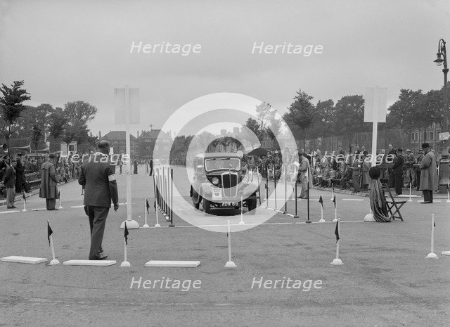 Morris saloon of RK Wellsteed competing in the South Wales Auto Club Welsh Rally, 1937 Artist: Bill Brunell.
