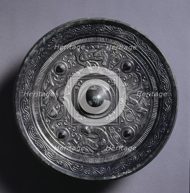 Mirror with a Central Square, an Immortal, and Auspicious Animals, 2nd century. Creator: Unknown.