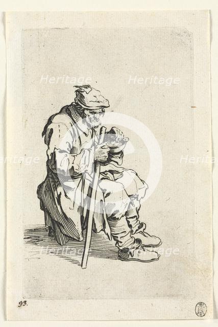 The Beggars: Beggar Sitting Down and Eating, c. 1623. Creator: Jacques Callot (French, 1592-1635).