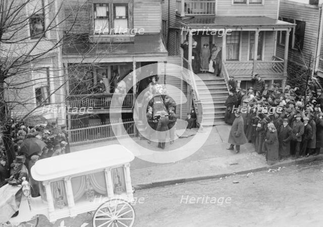Body of Dago Frank being carried to hearse, 1914. Creator: Bain News Service.