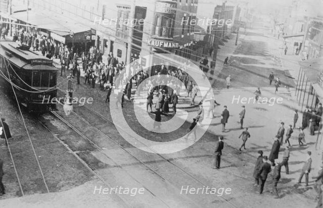 Rioters stoning a trolley car, Philadelphia, 1910. Creator: Bain News Service.