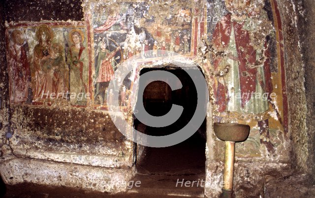 Detail of the interior of the sanctum of Mitreo and the mural paintings subsequently painted on t…