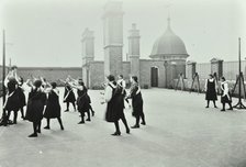Playing netball, Myrdle Street Girls School, Stepney, London, 1908. Artist: Unknown.