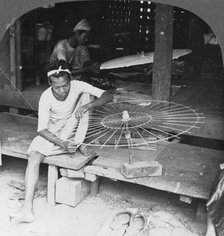 Boys making the native umbrella, Burma, 1908. Artist: Stereo Travel Co