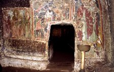 Detail of the interior of the sanctum of Mitreo and the mural paintings subsequently painted on t…