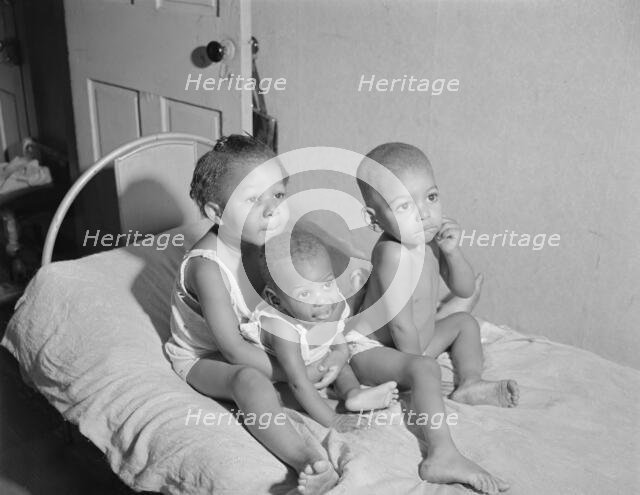 Grandchildren of Mrs. Ella Watson, a government charwoman, Washington, D.C., 1942. Creator: Gordon Parks.