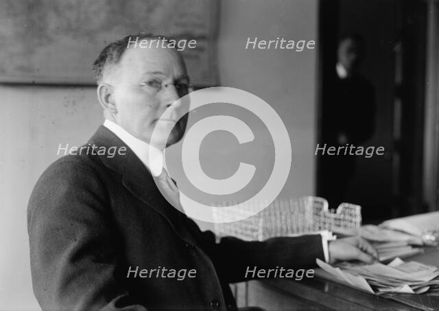 Walker D. Hines, Director General, U.S.R.R. Adm., at Desk, 1917. Creator: Harris & Ewing.