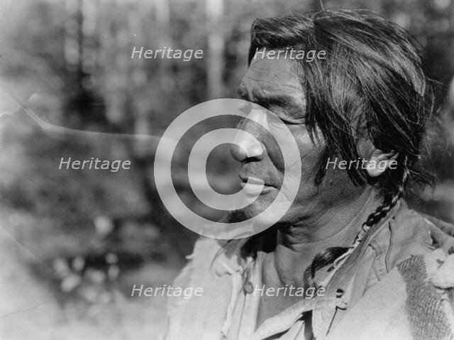 Agichida, Assiniboin, c1927. Creator: Edward Sheriff Curtis.