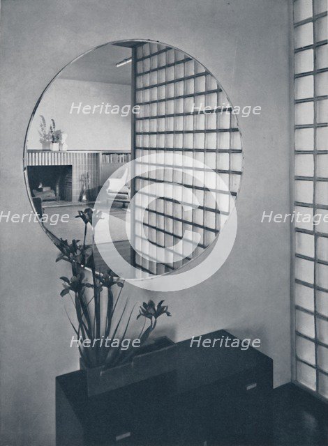 'Entrance hall in the house of Dr. and Mrs. James B. Graeser in Oakland, California, showning the gl Artist: Michael Goodman.