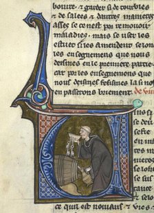 Initial 'V': a monk-cellarer tasting wine from a barrel whilst filling a jug, late 13th century.  Creator: Unknown.